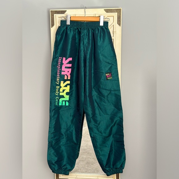 Vintage Pants - Vintage interplanetary body gear Teal 90s surf Windbreaker Pants with neon